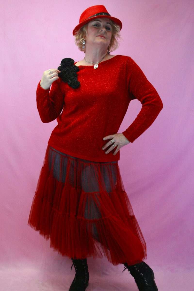 Woman wearing a quirky knitwear jumper